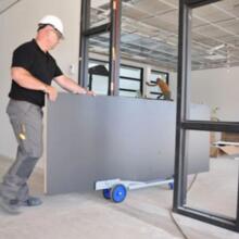 Outil de manutention et pose de porte